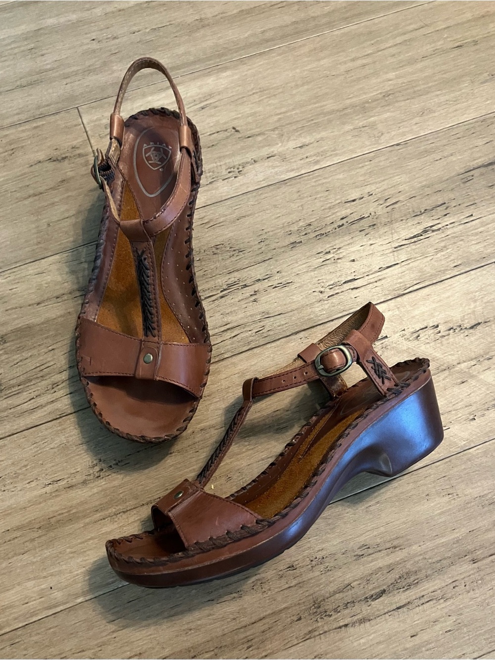 Ariat laced design brown leather t-strap buckle women’s heels. Size 8.5